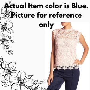 Nanette Lepore  Spring Fling Blue lace top with gold zipper in the back.